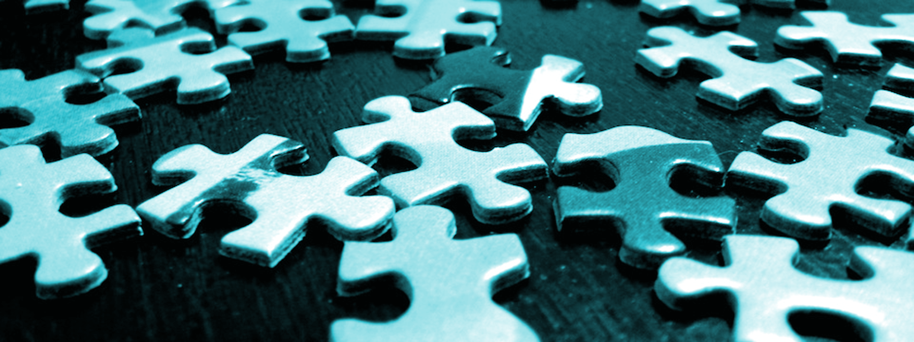 Verbundene Puzzleteile als Motiv für integrierte Standortdaten